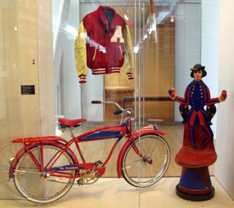 Gifts given to the Clinton's; bicycle, letter-man's jacket, and antique doll