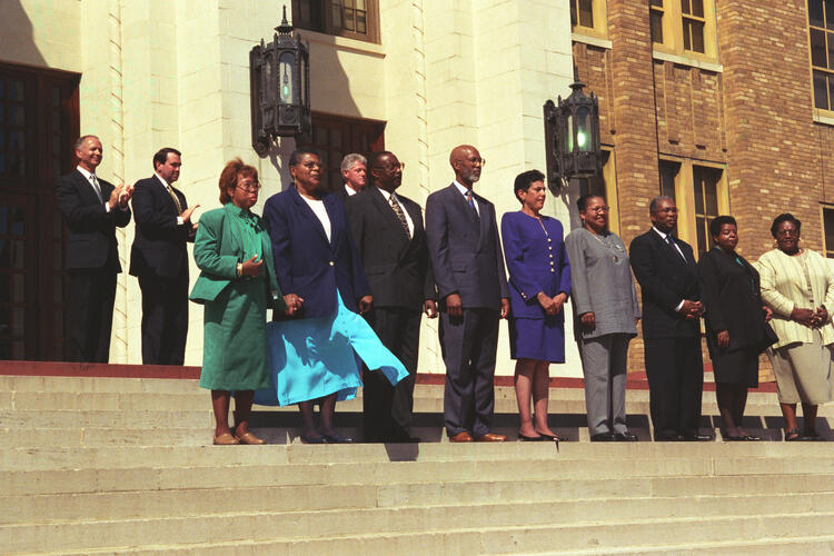 The Little Rock Nine present at Little Rock Central High School for the 40th Anniversary of Desegregation of the school. Present from Left to Right: Thelma Mothershed Wair, Minniejean Brown Trickey, Jefferson Thomas, Terrence Roberts, Carlotta Walls Ranier, Gloria Ray, Ernest G. Green, Elizabeth Eckford and Melba Pattillo Beals