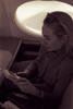 First Lady Hillary Rodham Clinton playing a Nintendo Game Boy Black and White photograph. First Lady Hillary Rodham Clinton playing a Nintendo Game Boy on the flight from Austin Texas enroute to Washington, D.C. A