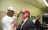 Arkansas Razorback President Clinton congratulates and celebrates with Arkansas Razorback basketball player, Corliss Williamson after the Razorbacks won the 1994 National Championship. Williamson was awarded the Most Valuable Player (MVP). The President wears a red Arkansas razorback shirt.