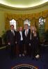President Clinton and Vice President Gore pose for a photo with musician Tom Petty and wife Jane Petty in the Oval Office