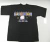 A black crewneck t-shirt is laid flat against a light grey surface, featuring a colorful, stylized 1990s graphic on the front. At the top of the graphic, the word "ORIGINAL" is printed in spaced white letters above a rectangular box containing the words "WORLD CUP" in an artistic font with shades of purple, yellow, and blue. Below this box, the phrase "IN YOUR FACE" is printed in white letters, followed by a central illustration of a soccer ball splashes into blue water. The yellow text "USA 94" flanks ....