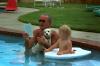 President Lyndon B. Johnson in Swimming Pool President Lyndon B. Johnson on his Birthday in Swimming Pool with his Dog and Grandson