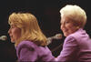 First Lady Hillary Rodham Clinton at the Liz Carpenter Lectureship Event First Lady Hillary Rodham Clinton addressing attendees of the Liz Carpenter Lectureship Event at the Erwin Center, University of Texas. Governor Ann Richards is seated to the right of the First Lady