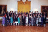 Health Care Task Force Cluster Group Four rows of people stand on risers. President William Jefferson Clinton, First Lady Hillary Rodham Clinton, and Second Lady Mary Elizabeth "Tipper" Gore posing for a group photograph with the Health Care Task Force Cluster Group in the East Room of the White House