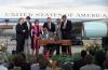 William J. Clinton Signing a Wilderness Act President William J. Clinton signing a Wilderness Act on the tarmac at the Stapleton International Airport in Denver, Colorado. Ceremony Participants pictured Left to Right: Governor Roy Romer, Representative David Skaggs, Representative Patricia Schroeder, Senator Hank Brown, Senator Ben Nighthorse Campbell, and Tim Wirth