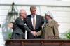 Middle East Peace Agreement Ceremony President William J. Clinton presiding over the handshake of Israeli Prime Minister Yitzhak Rabin and Palestinian Liberation Organization (PLO) Chairman Yasser Arafat during the Middle East Peace Agreement signing ceremony. The ceremony was on the South Lawn of the White House