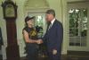 President William J. Clinton greets musician Willie Nelson in the Oval Office of the White House
