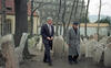 President Clinton visits the historic Old Jewish Cemetery and walks among the graves in Prague with tour guide, Jaroslav Safranek
