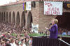 Health care rally at the University of Colorado First Lady Hillary Rodham Clinton addressing a health care rally at the University of Colorado at Boulder, a sign in the background reads "Give em' Health Hillary!"