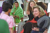 Hillary visits with a young women in Burki Village, Lahore, Pakistan, March 23, 1995, Photographer: Barbara Kinney.