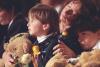 Memorial Service A child holds a teddy bear at the memorial service for victims of the bombing of the Murrah Federal Building in Oklahoma City