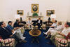 President Clinton meets with his advisers in the Oval Office regarding Bosnia. Participants include Sec. Warren Christopher, Tony Lake, Gen. John Shalikashvili, Amb. Madeleine Albright, Leon Panetta, George Tenet, Mike McCurry, Sandy Berger, Undersecretary of Defense John White, Leon Fuerth, Walt Slocumbe and others