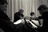 State of the Union Prep 1996 Black and White Photo. President Clinton works on his State of the Union Speech with Vice President Gore, Leon Panetta, and George Stephanopoulos in the Family Theater in the White House