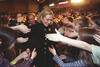 Hermantown Middle School Hillary Rodham Clinton shakes hands with the crowd around her at the Hermantown Middle School in Hermantown, Minnesota