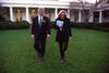 President Clinton walks across the White House Rose Garden with the Director of the Office of Scheduling, Stephanie Streett.