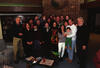 Thanksgiving President Clinton, Hillary Rodham Clinton, and Chelsea Clinton are pictured with a large group of family and friends in the living room at Camp David.