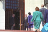 President Clinton symbolically holds the door for the Little Rock Nine, welcoming them into the same school that denied them entrance 40 years before