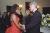 President Clinton greets mezzo-soprano opera singer Denyce Graves in a receiving line in the Blue Room of the White House during the NPR anniversary event