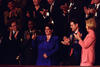 State of the Union 1998 First Lady Hillary Rodham Clinton attends the State of the Union in the House Chamber at the United States Capitol, Washington D.C. She is seated in the visitors gallery with former welfare recipient Elaine Kinslow and Army Sergeant Michael Tolbert who served in Bosnia. The President acknowledges Kinslow and Tolbert