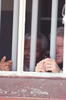 President Clinton and President Nelson Mandela stand behind bars in the Cell Block B in the Robben Island prison that once held Nelson Mandela. 