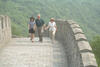The Great Wall President Clinton, Hillary Rodham Clinton, and Chelsea Clinton hold hands as they walk along the Great Wall. The First Lady and Chelsea wear hats and sunglasses.