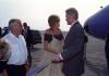 President Clinton greets entertainer Carly Simon on the tarmac at Martha's Vineyard Airport