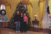 Christmas Tree President Clinton, Hillary Rodham Clinton, and Chelsea Clinton pose together in front of the family Christmas tree in the Yellow Oval Room in the White House. The First Family is dressed in casual dress. The President wears jeans and sneakers.