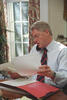 President Clinton talks on the telephone in the Oval Office Dining Room 