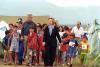 Stenkovic 1 Refugee Camp President Clinton and Hillary Rodham Clinton walk through Stenkovic 1 Refugee Camp with young Kosovar refugees near Skopje, Macedonia