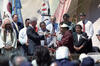 President Clinton at the Pine Ridge Reservation Millie Horn Cloud performs a traditional pipe ceremony with President Clinton at the Pine Ridge Reservation in South Dakota on July 7, 1999