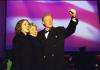 Millennium Gala at the Lincoln Memorial President Clinton, First Lady Hillary Rodham Clinton and Chelsea Clinton attend the Millennium Gala at the Lincoln Memorial in Washington D.C. President Clinton raises his fist as as the first family smiles during the New Years' fireworks display at midnight. An American Flag waves on a screen in the background