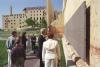 Oklahoma City Memorial President Clinton observes a dedication wall at the Oklahoma City National Memorial