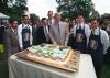 President Clinton's 54th Birthday Party President Clinton looks at his birthday cake with creator Glen Maes and the White House Mess Personnel on the South Lawn of the White House
