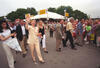 New York State Fair Hillary Rodham Clinton and President Bill Clinton attend the New York State Fair in Syracuse, New York. The First Lady waves at the gathered crowds as she walks at the fairgrounds