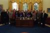 President Clinton joins Sandra (Sandy) Thurman, Director of the Office of National AIDS Policy and the President Advisory Council on HIV and AIDS for a staff group photo in the Oval Office