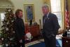 President Clinton talks with musician Jon Bon Jovi in the Oval Office