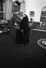 Alone in the Oval Office President Clinton and First Lady Hillary Rodham Clinton are alone in the Oval Office near the Resolute Desk. They stand close together with foreheads touching