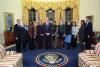 President Clinton joins Jason Cooper, Mary Morrison, Helen Robinson, Ann McCoy, Nancy Hernreich, Betty Currie, Janis Kearney, Doug Band and others from the Oval Office Operations Office for a group photo in the Oval Office