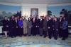 President Clinton joins the staff of the Council on Environmental Quality for a group photograph in the Diplomatic Reception Room