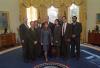 President Clinton joins the staff of the Office of the Special Envoy for a group photo in the Oval Office