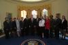 President Clinton joins the staff of the Management and Administration Office for a group photo in the Oval Office