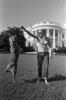 Susan Ford playing and her dog Liberty Susan Ford playing with the her dog Liberty on the South Lawn of the White House