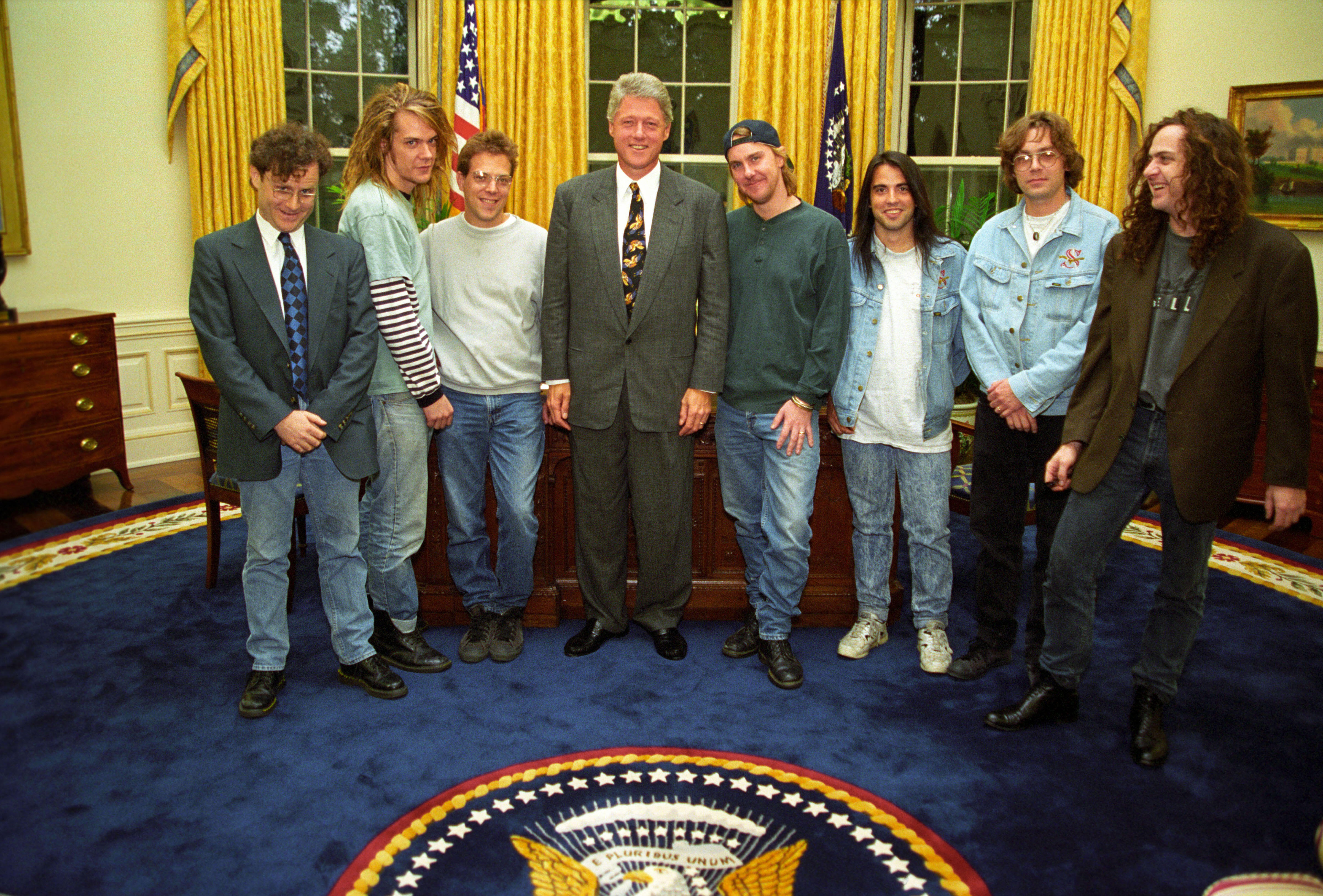 President Clinton poses for a photo in the Oval Office with members of the rock band Soul Asylum, and others. Present for the photo include, Dave Pirner, Karl Mueller, Dan Murphy, Grant Young, and others.