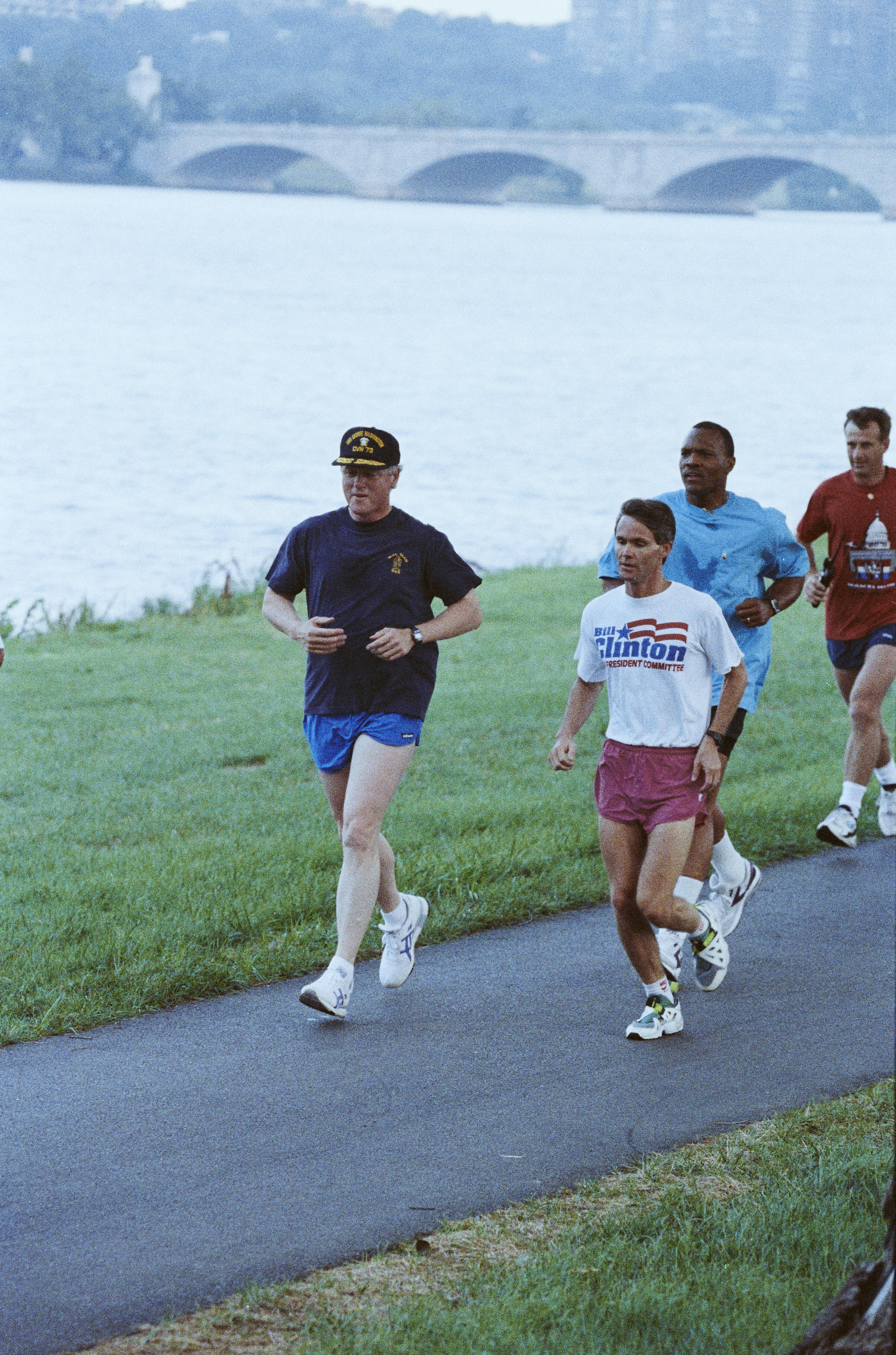 President Clinton and Billy Webster jog along the Potomac River.