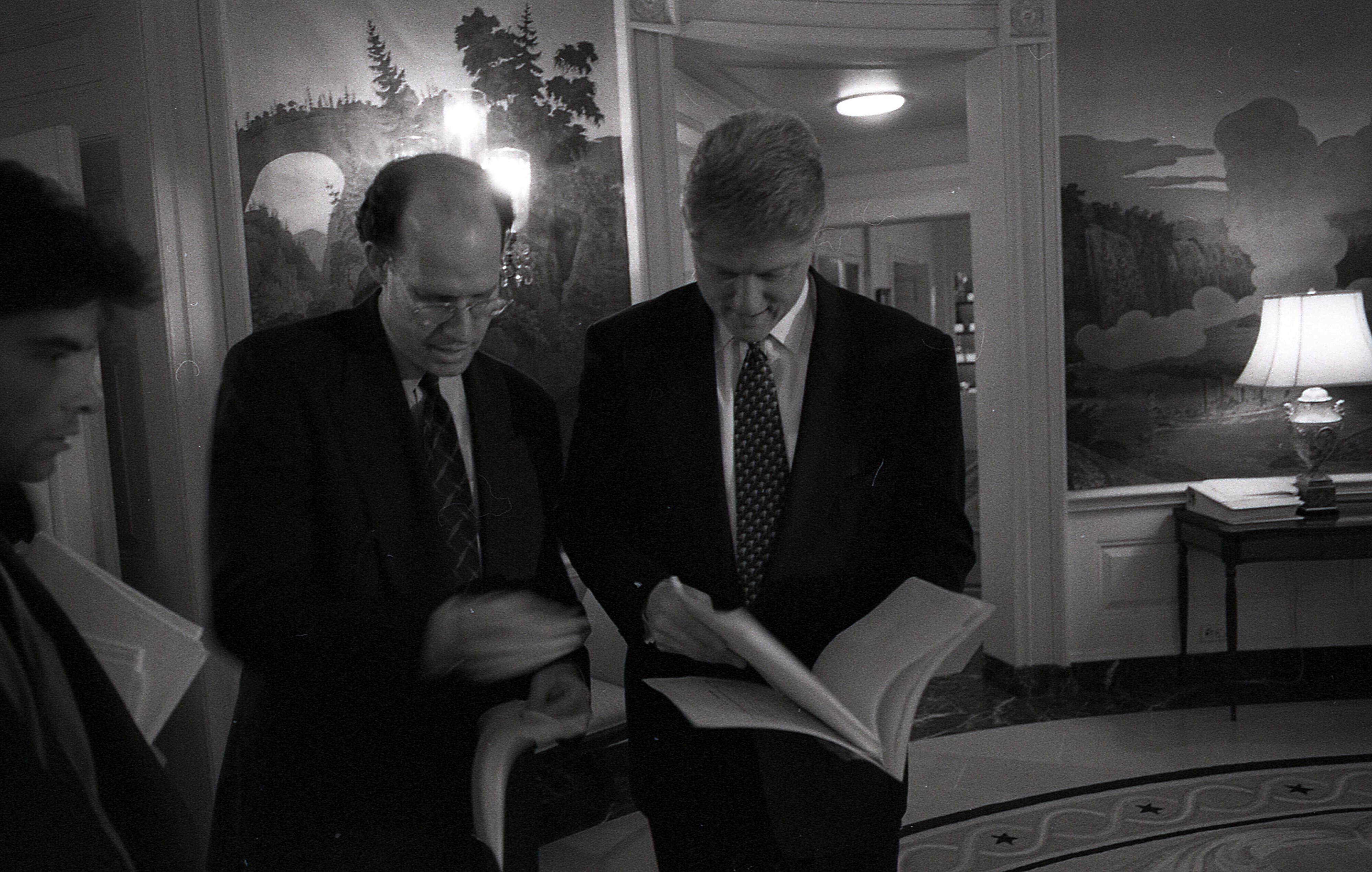 Black and White Photograph, President Clinton Reviews his State of the Union address in the Diplomatic Reception Room in the White House with George Stephanopoulos and Don Baer