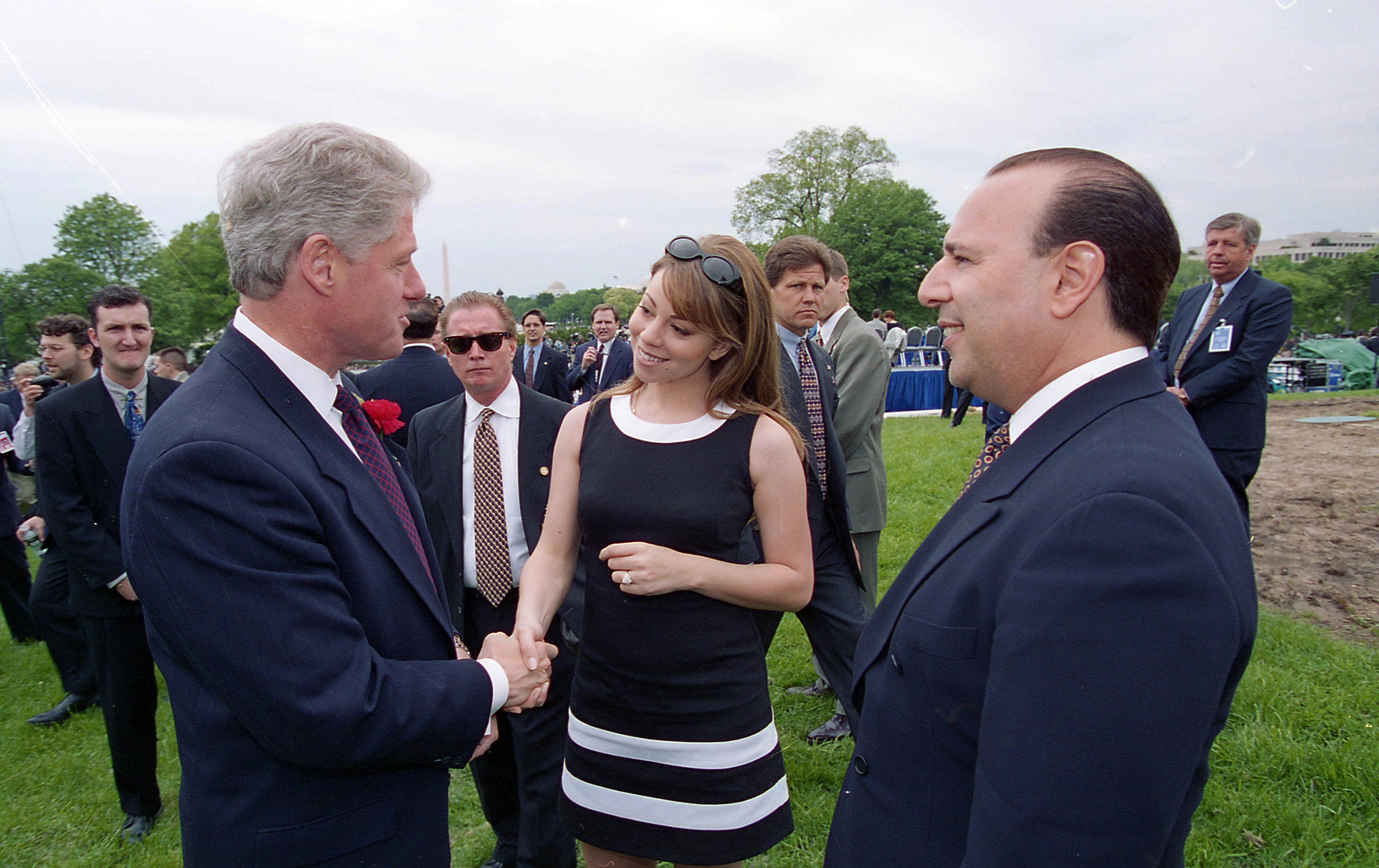 President Clinton greets singer Mariah Carey at the U.S. Capitol. Mariah performs at the 15th Annual National Peace Officers Memorial Service