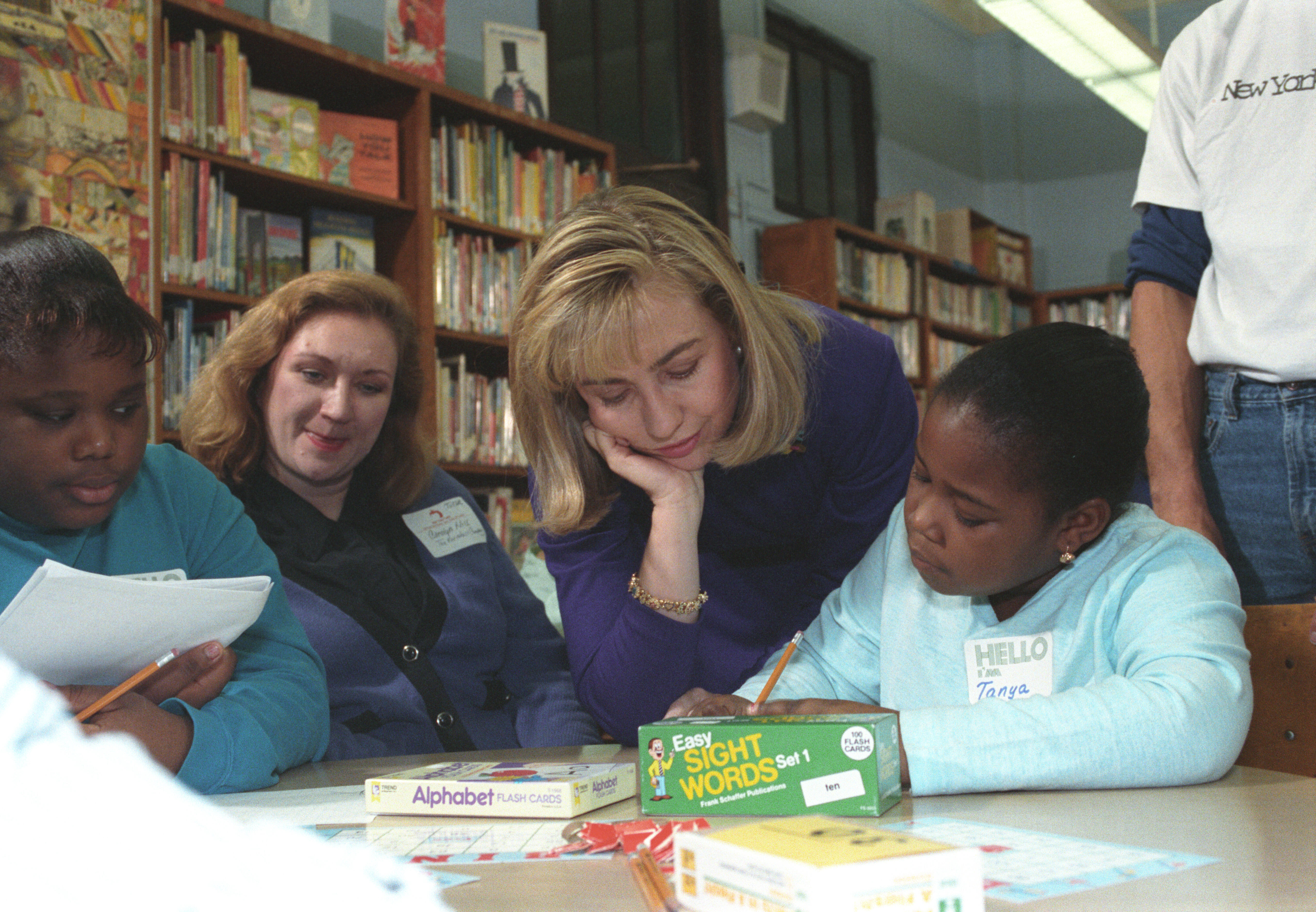 First Lady Hillary Rodham Clinton participates in a "New York Cares" tutoring session with children at Public School 115 in New York City, New York