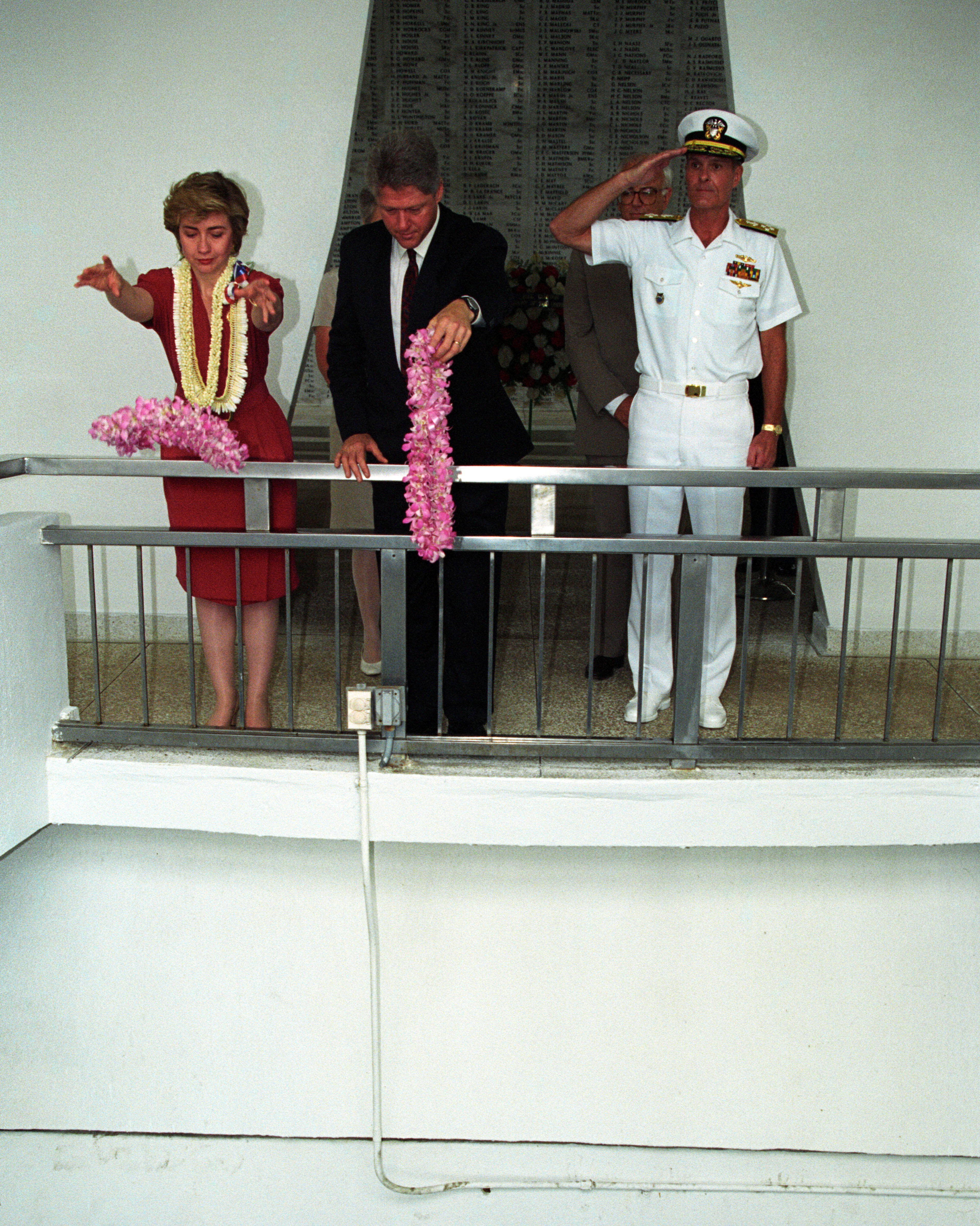 President Clinton and Hillary Rodham Clinton participate in a service honoring the U.S.S. Arizona and Pearl Harbor in memoriam