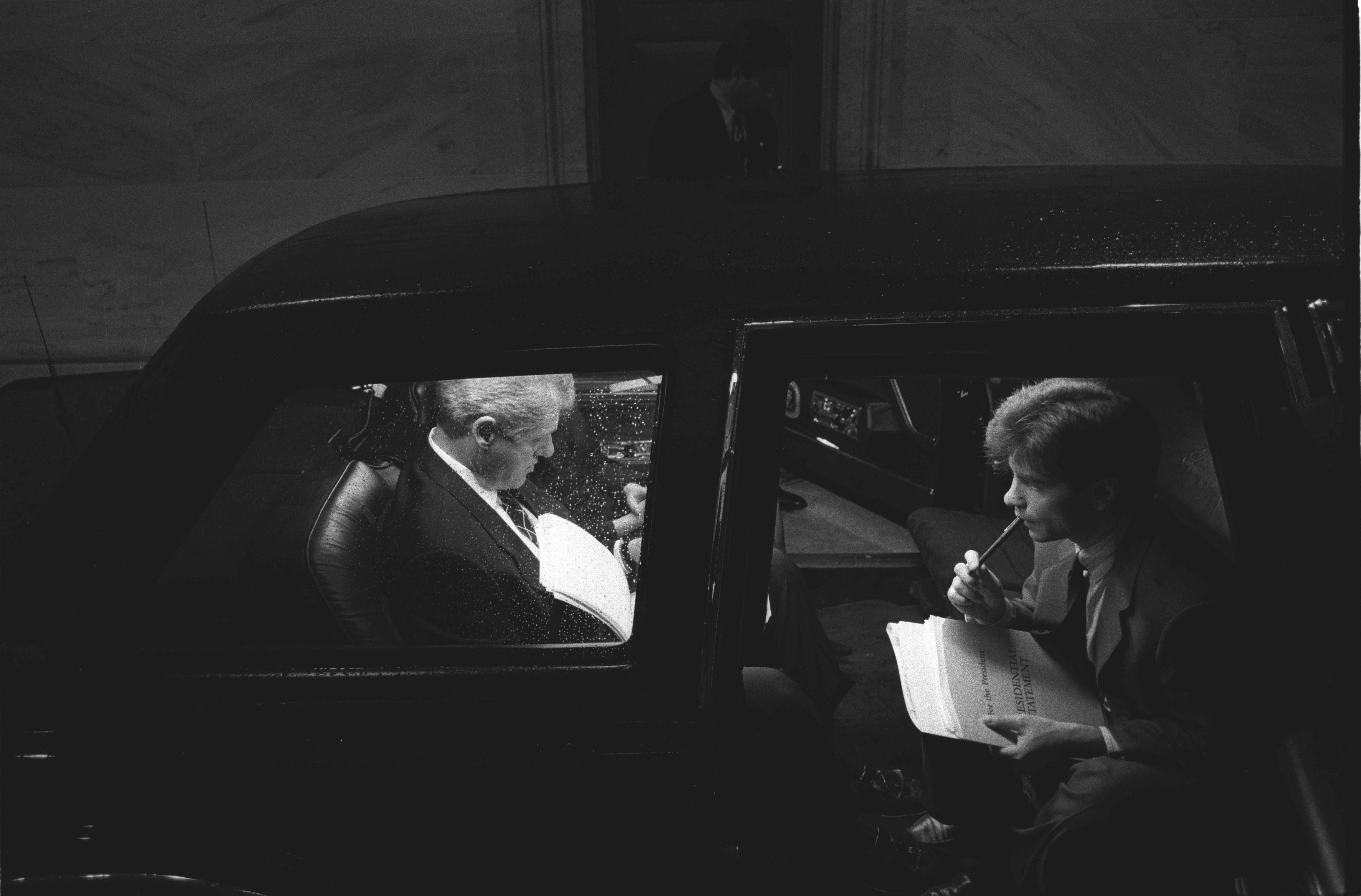 Black and White Photo. President Clinton preparing for 1994 SOTU with George Stephanopoulos in the Presidential Limousine on the day of the speech